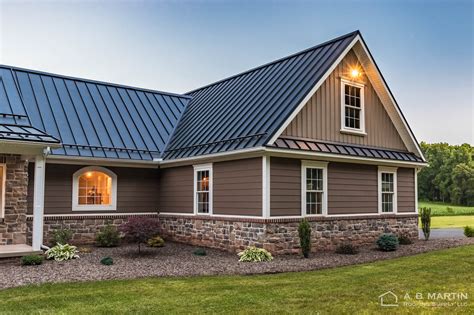 black metal roof white brick house|brick house metal roof colors.